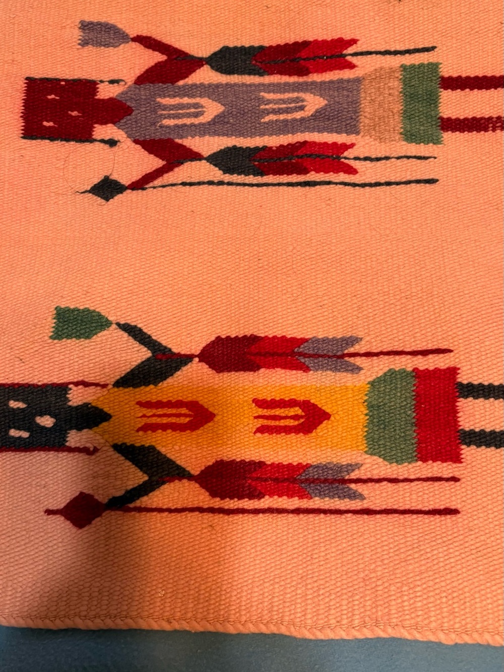 Handwoven Pink Decorative Textile with Multicolor Figures